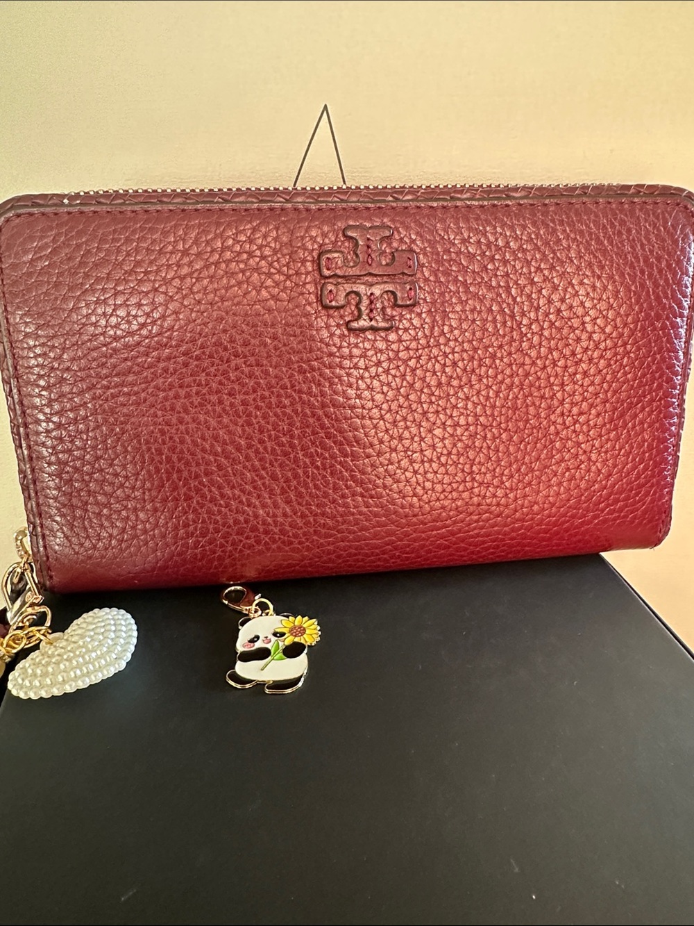 Tory Burch Pebbled Leather Zip Wallet in Deep Red with Heart charm and Panda